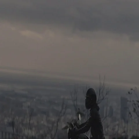 Motorcycle Over Sunset at City Stock Footage 69713242