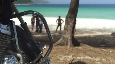 Motorcycle paking on sea beach background. Motorbike standing on parking and Stock Footage 93190230
