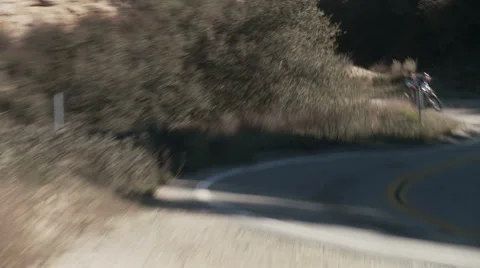 Motorcycle pass 1 Stock Footage 1064384