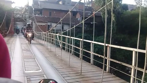 Motorcycle pedestrian bridge Stock Footage 211086415
