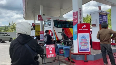 Motorcycle Queue at Fuel Station During Busy Refueling Time Stock Footage 330309365