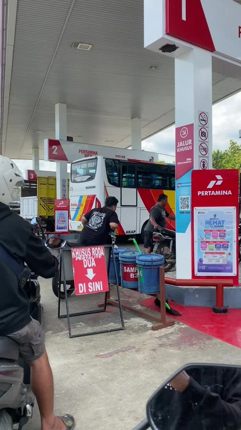 Motorcycle Queue at Fuel Station During Busy Refueling Time Stock Footage 330309470