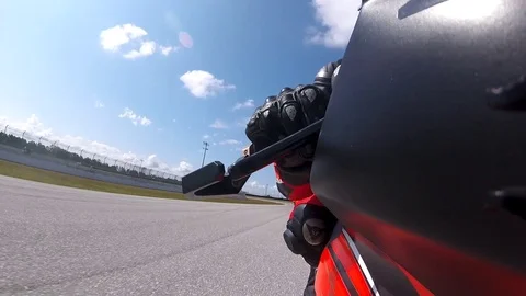 Motorcycle Racer Passes Opponent In A Turn Stock Footage