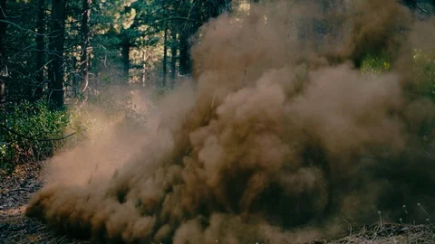 Motorcycle races through forest and sprays dirt from banked trail extreme act Видео 103565285