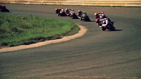 Motorcycle racing HD slow motion video. Moto riders in turn on city road Stock Footage