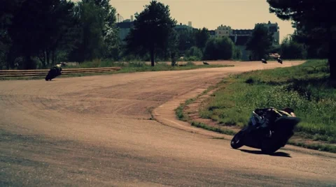 Motorcycle racing HD slow motion video back view. Moto riders turn Stock Footage 67862028