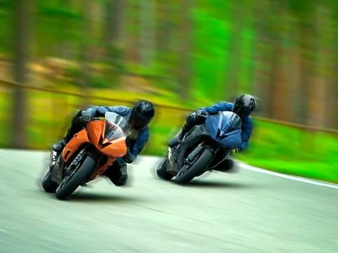 Motorcycle racing Stock Photos
