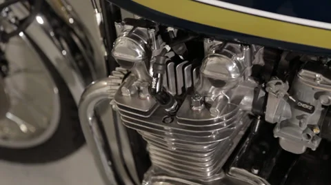 Motorcycle rail move acorss engine Stock Footage 34333369