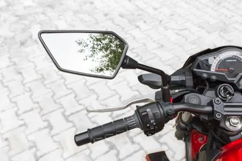 Motorcycle rear view mirror. Stock Photos