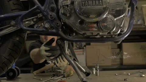 Motorcycle repair Stock Footage 147554912