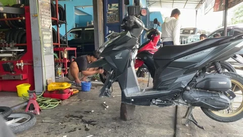 Motorcycle Repair at Local Workshop Stock Footage 330875036