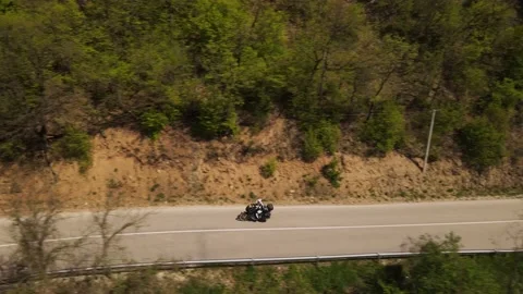 Motorcycle ride drive on the open road in sunny day in spring Stock Footage 239257445