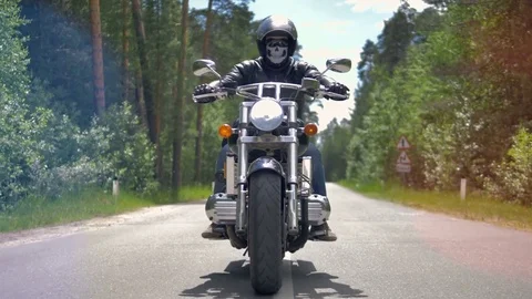Motorcycle ride on empty road in forest. Stock Footage