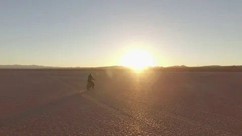 Motorcycle ride through the desert Stock Footage 70324098