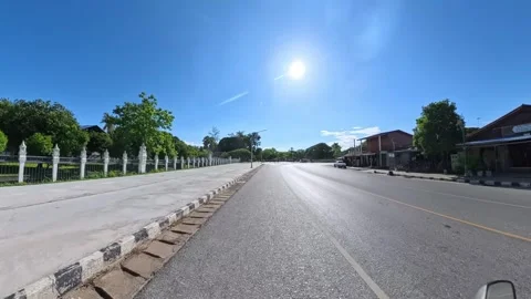 Motorcycle Ride Through Historic Sukhothai, Thailand Stock Footage 344907153