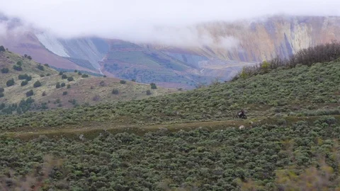Motorcycle rider in distance Video stock 91911684