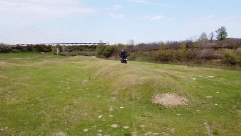 Motorcycle rider on field Stock-Footage 221001820
