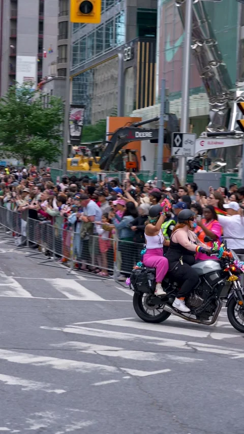 Motorcycle Riders Celebrating Pride Parade with Cheering Crowd Toronto 스톡 동영상 332018048