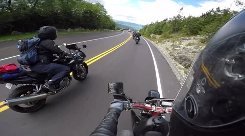 Motorcycle riders in the mountains Stock Footage 56565329