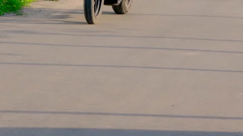 The motorcycle rides down the street. Selective focus. Stock Footage 155045537