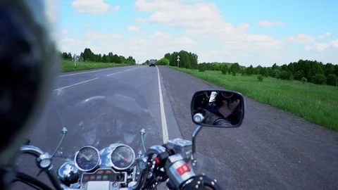 Motorcycle rides on the road in the first person Видео 110623944