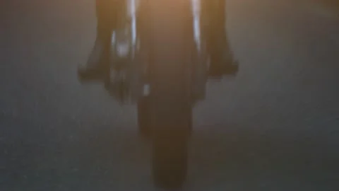 Motorcycle rides on the road in the forest Stock Footage 147554390