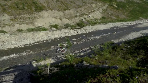 Motorcycle rides through the mountains Stock Footage 280872610