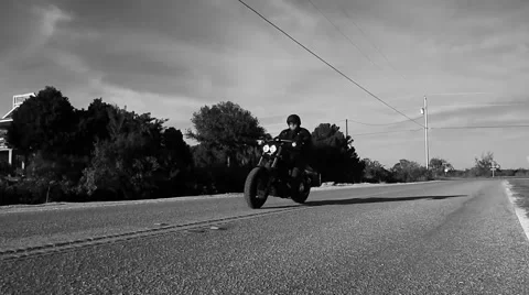 Motorcycle riding down the road Stock-Footage 45290848