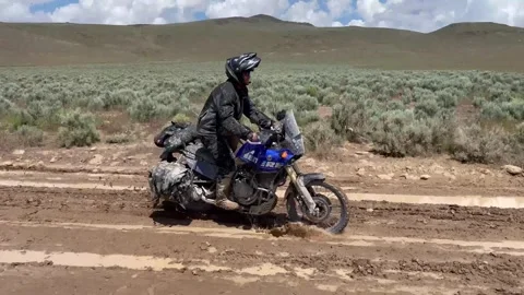 Motorcycle Riding on Slick Mud Vídeos de archivo 243390993