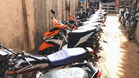 Motorcycle row at local beach front Stock Footage 103455412