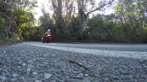 Motorcycle on a Scenic Road Stock Footage 48835172