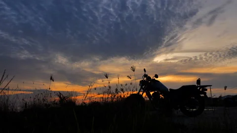 Motorcycle silhouette at sunset time Stock Footage 133943932
