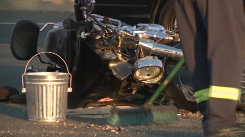 MOTORCYCLE SMASHED IN ROAD AFTER ACCIDENT MOTORBIKE CLEANUP HD HIGH DEFINITON Stock Footage 41928338