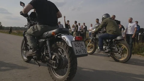 The motorcycle starts to ride Stock Footage 123584087