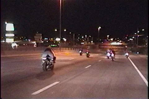 Motorcycle surfing Stockbeeldmateriaal 7751529