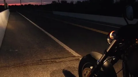 Motorcycle takes off into darkness Stock-Footage 45290676
