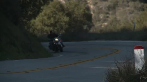 Motorcycle uphill 2 Stock Footage 1066141
