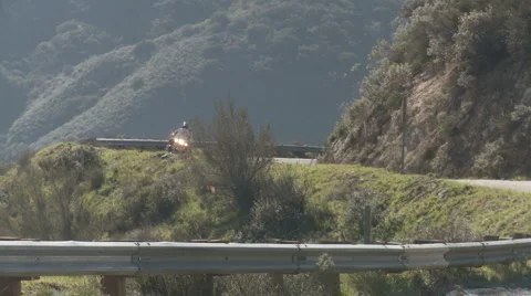 Motorcycle uphill curve 1 Stock Footage 1065978