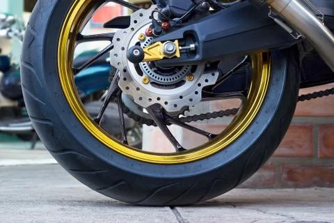 Motorcycle wheel and ABS brakes on street 库存照片