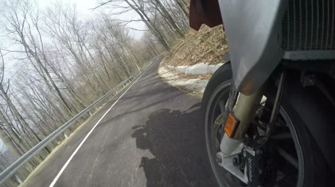 Motorcycle Wheel Close-up racing on the countryside Stock Footage 63018136