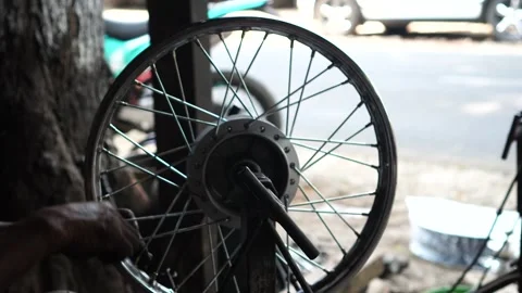 Motorcycle wheel spoke repairs Stock-Footage 263832171