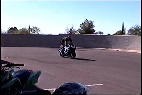 Motorcycle wheelie gone wrong Stockbeeldmateriaal 7751549