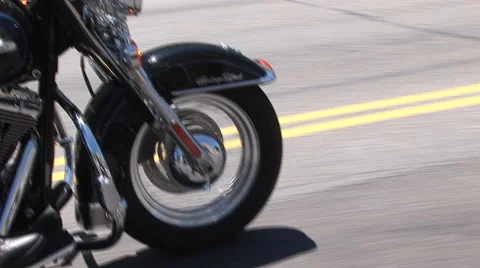 Motorcycle wheels roll down the highway Stock-Footage 41296166