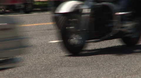 Motorcycle wheels roll by endlessly Stock-Footage 41266656