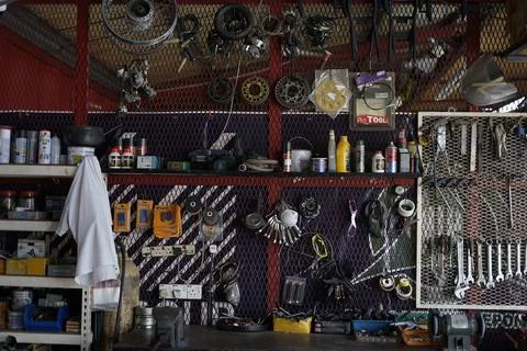 Motorcycle workshop with lots of tools in the garage Stock Photos