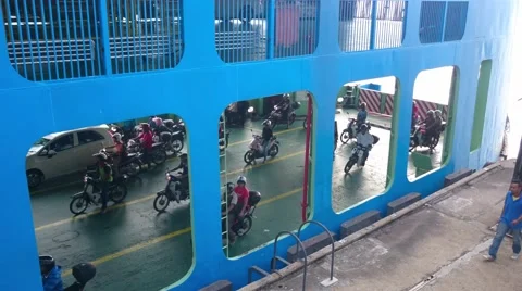 Motorcycles Exiting Ferry, Pan Left Video stock 64164514