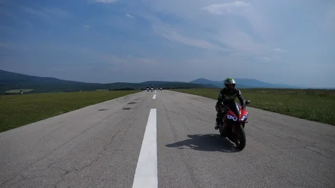 Motorcycles in group on the road Stock Footage 102028562