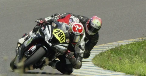 Motorcycles racing at 200 FPS Stock Footage 84745192