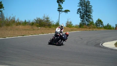Motorcycles racing in slow motion Stock Footage 126740190