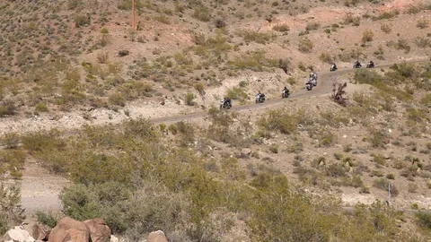 Motorcycles riding through the mountains 스톡 동영상 105230719